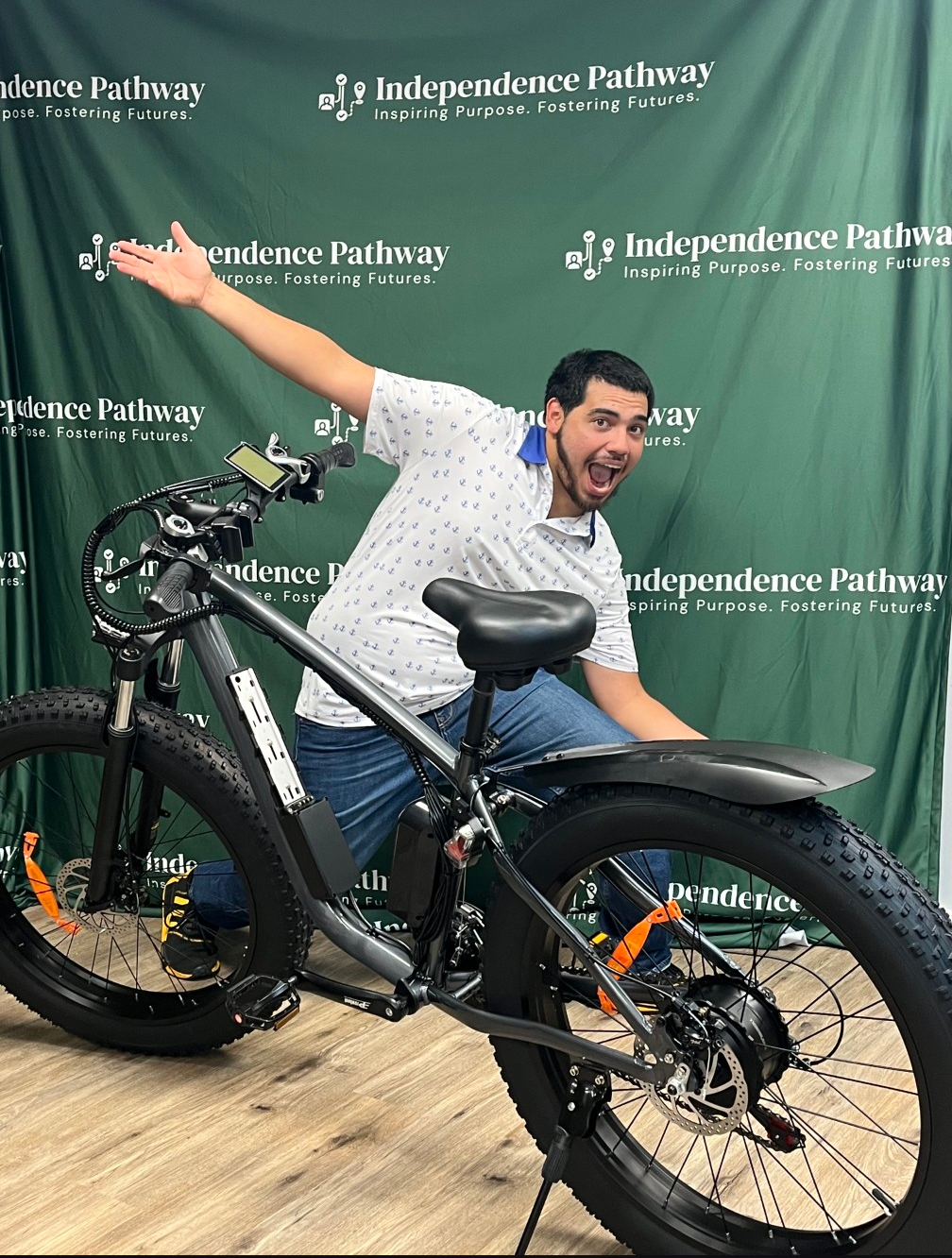 Showing Off His New E-Bike